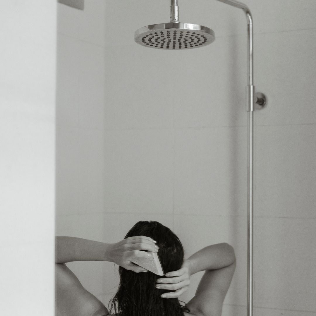 Aislinn Derbez showering beautiful hair natural shampoo