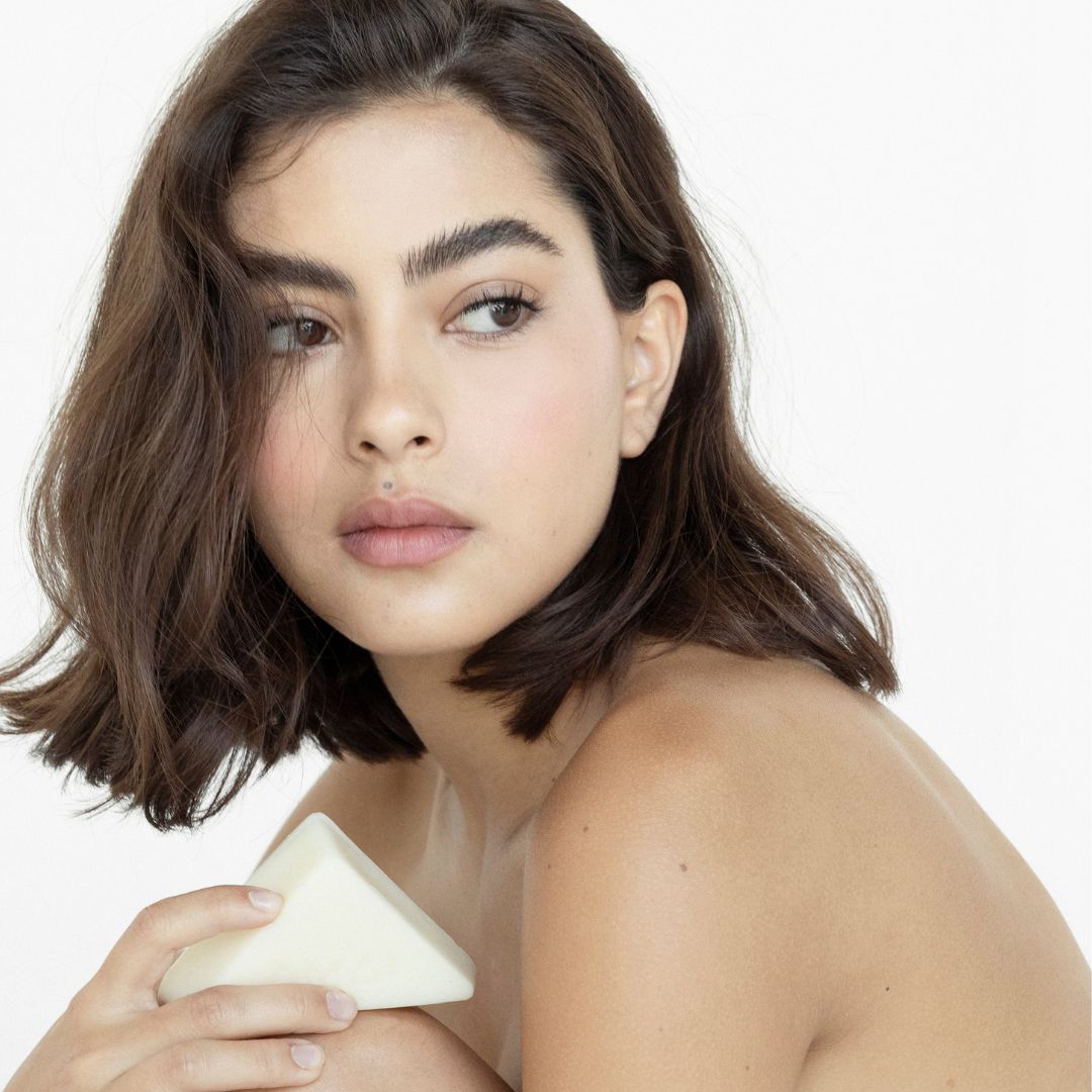 Woman With Sensitive Skin Moisturizing Cream Stick In Hand