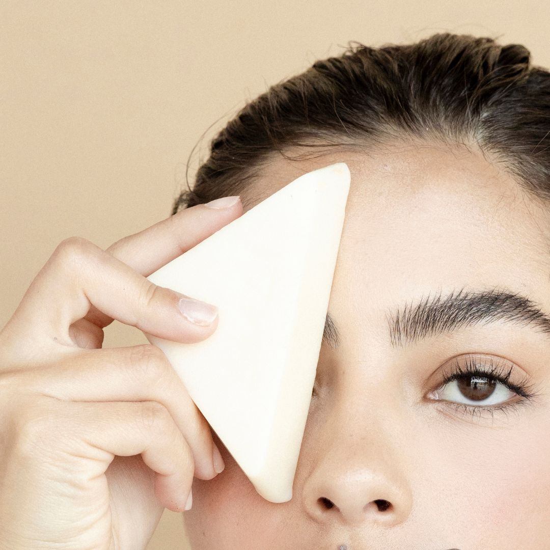 Woman with natural apricot bone makeup remover bar