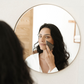 Aislinn Derbez cleans her face with activated charcoal soap